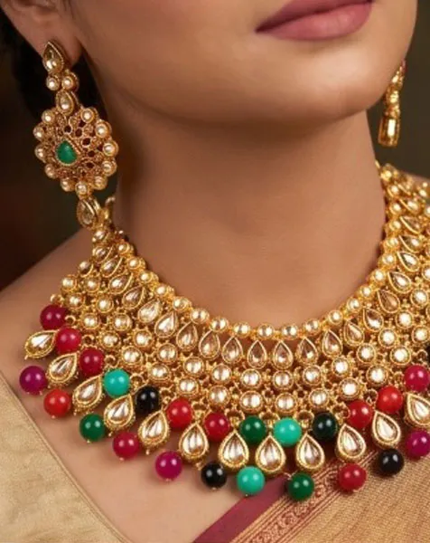 Royal Kundan-Style Multicolored Choker Jewelry Set includes a statement choker matching drop earrings, and a coordinated maang tikka. thumbnail